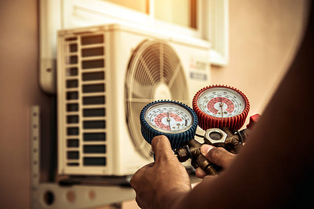 Professional Heat Pump Repair technician working in Lynchburg, VA